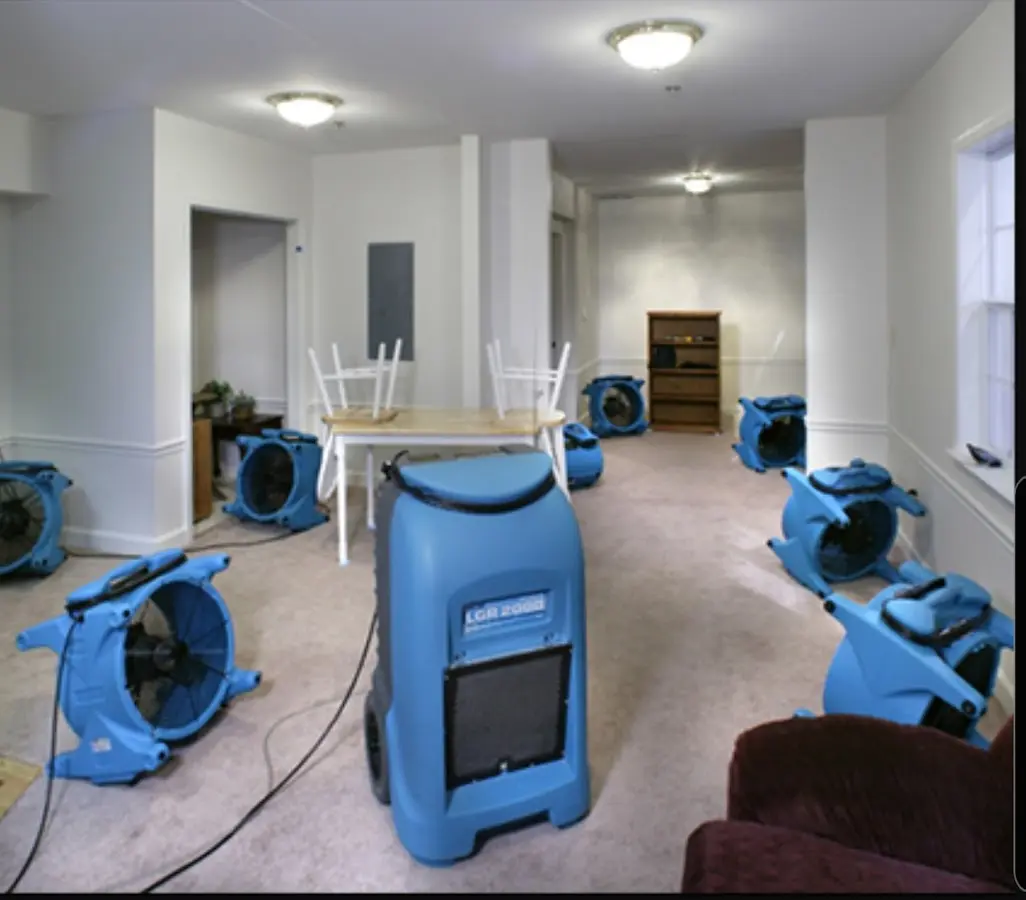 Air movers and dehumidifier setup for Water Damage Restoration in El Paso