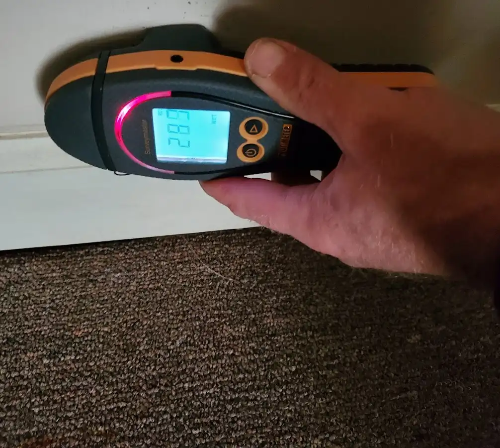 Moisture detection at baseboard during Mold Inspection & Testing in El Paso